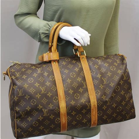 louis vuitton holdall women's|louis vuitton men's luggage.